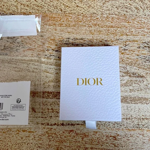 Dior gold phone charm NEW with box